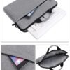 15.6-inch slim and waterproof laptop bag that can be carried by hand, on the shoulder, or crossbody.
